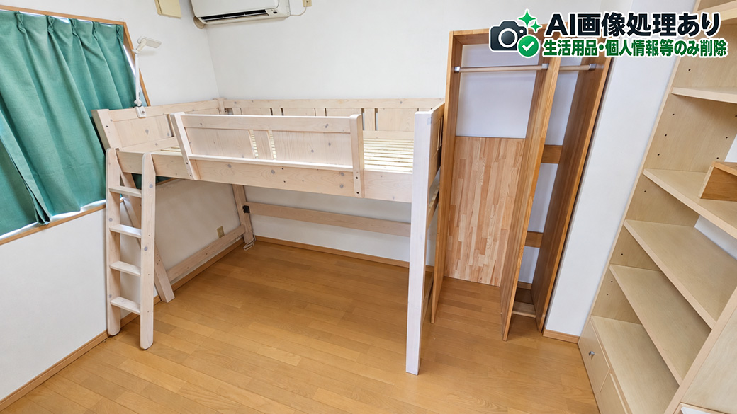 立体的な家具を置いた洋室。床面を広く使う工夫が見える一室です。